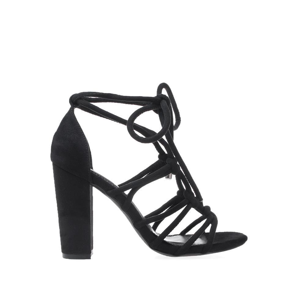 Black colored woman heels with lace strap design and ankle lace closure