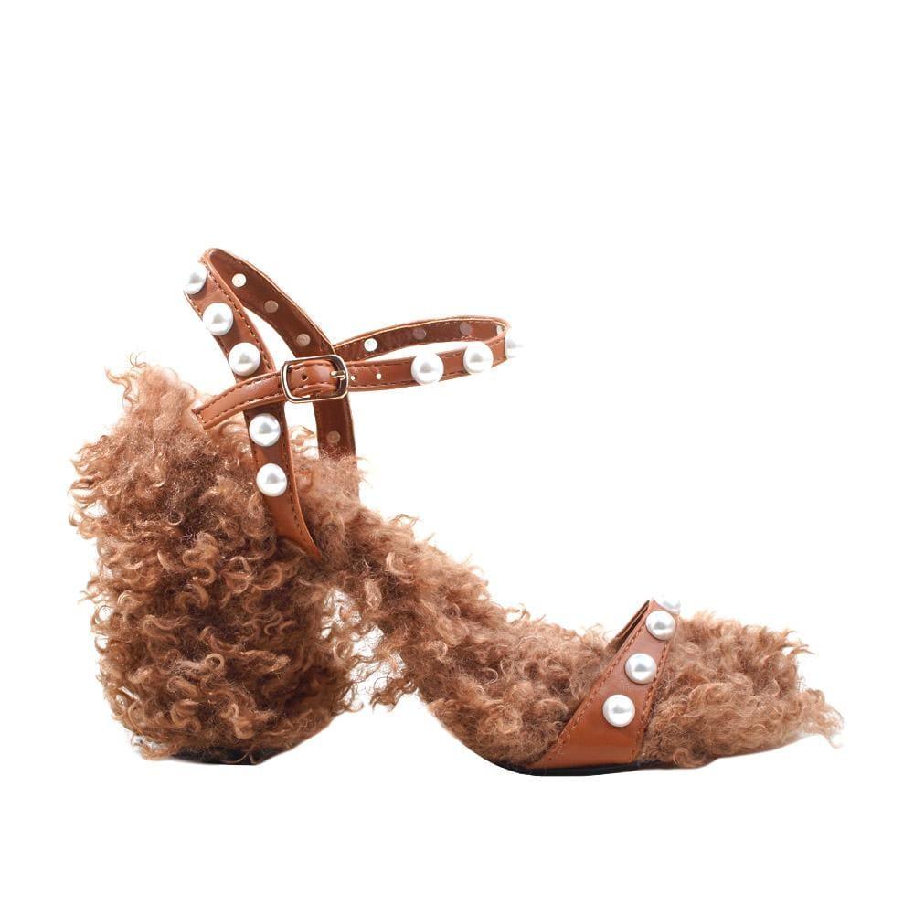 Tan pearl studded shearling upper heels with ankle buckle clasp