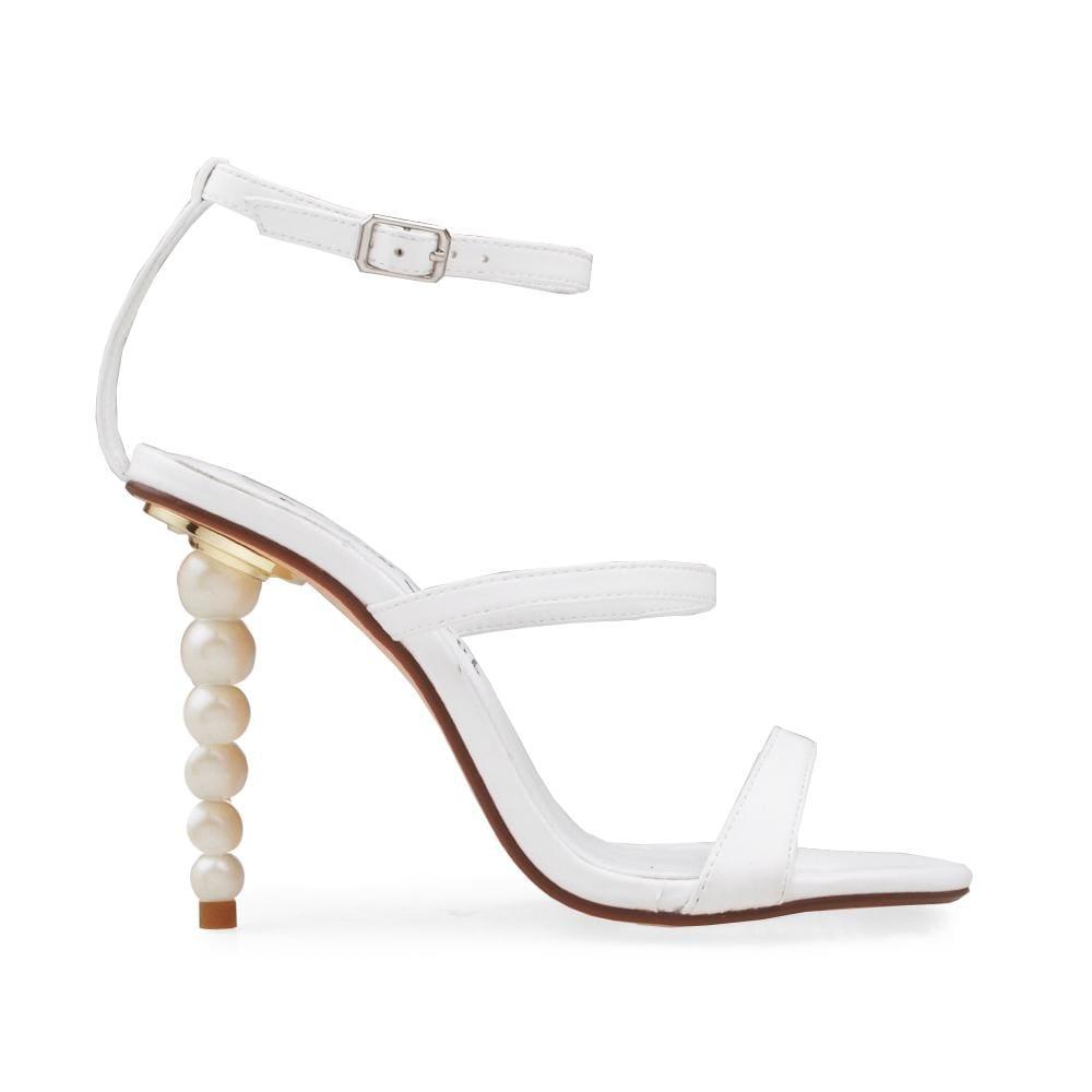 White colored beaded heels with ankle buckle closure