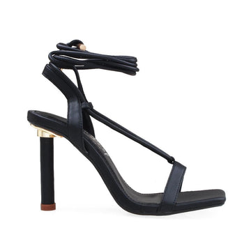 Stiletto heels with wrap around ankle, slander straps and ankle lace closure in black color