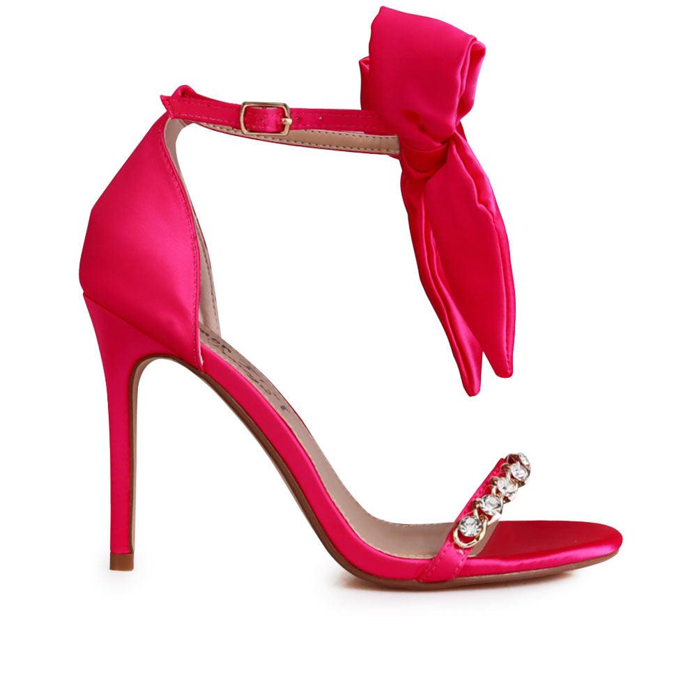 Fuchsia heels with gem-encrusted strap and ankle buckle clasp with bow design