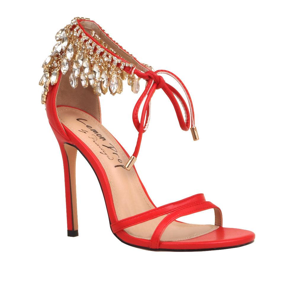 Red leather women's stiletto heels with marquise-shaped studs-corner view