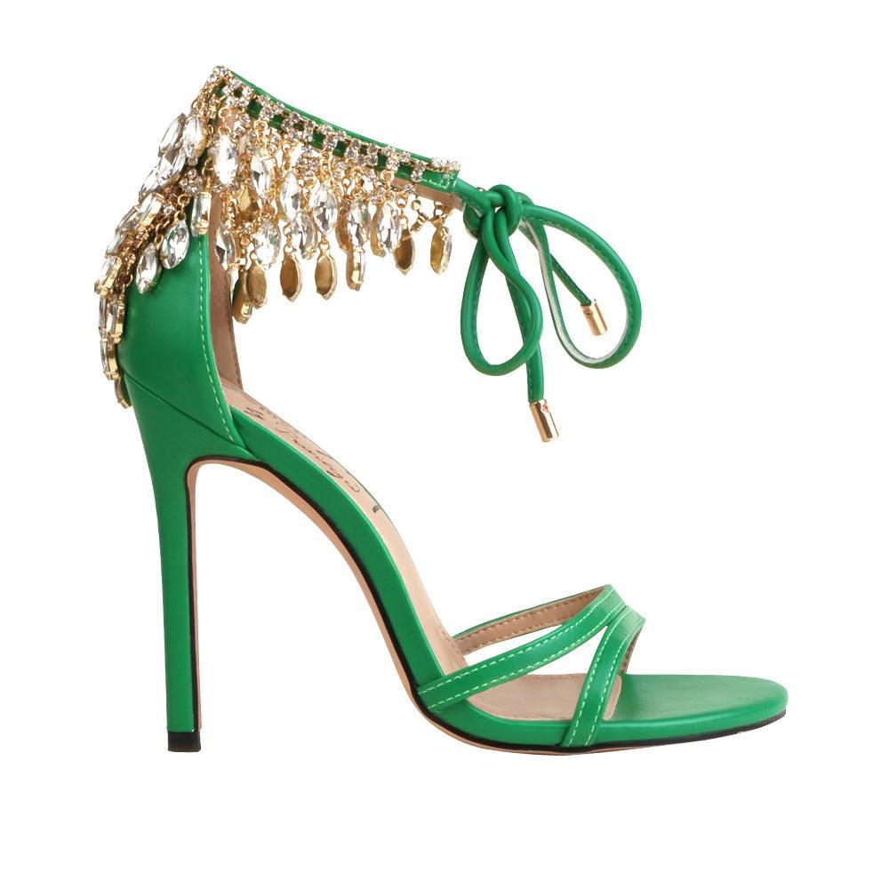 Green leather women's stiletto heels with marquise-shaped studs-side view