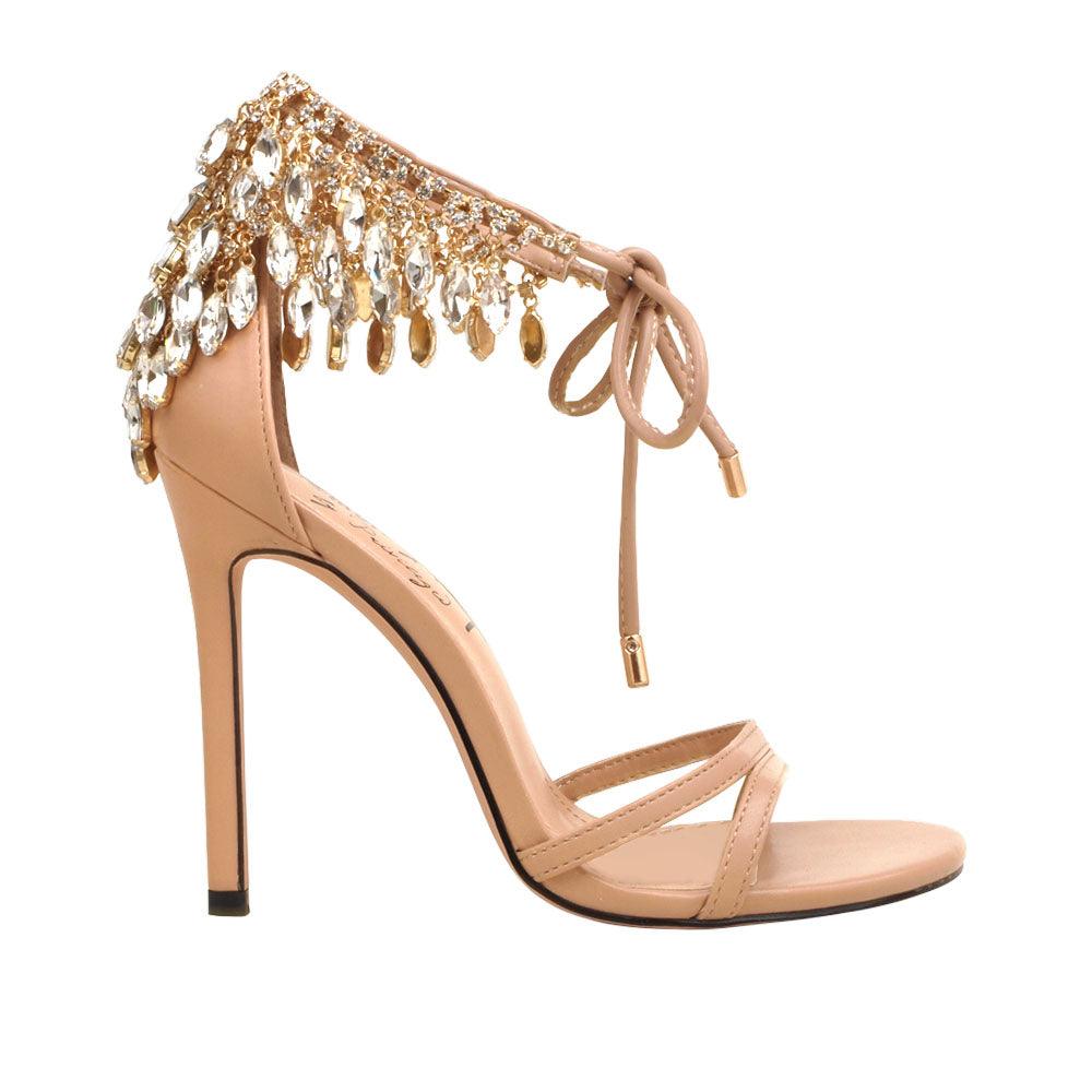 Nude leather women's stiletto heels with marquise-shaped studs-side view