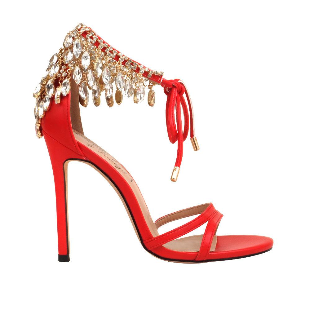 Red leather women's stiletto heels with marquise-shaped studs-side view