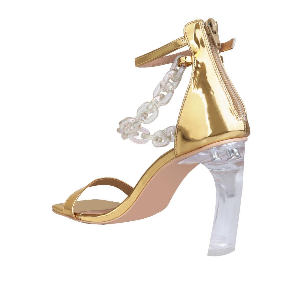 Gold leatherette women's heel with chain-posterior view