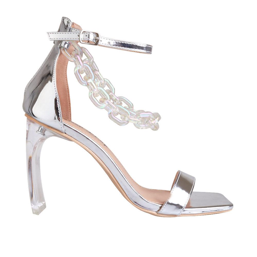 Silver leatherette women's heel with chain-side view