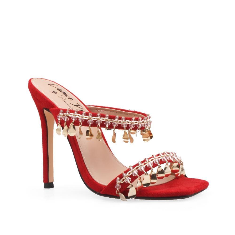 Red vegan patent leather women's heel embellished with gold metallic charms-corner view