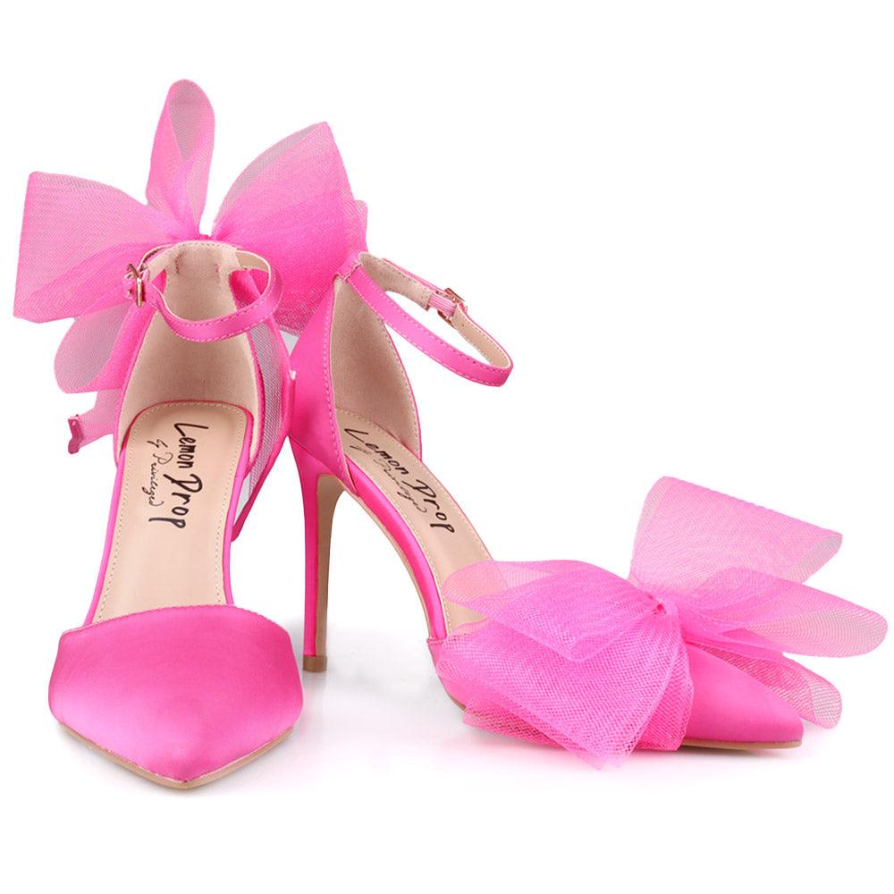 Pink coloured women's heel with front and back bow