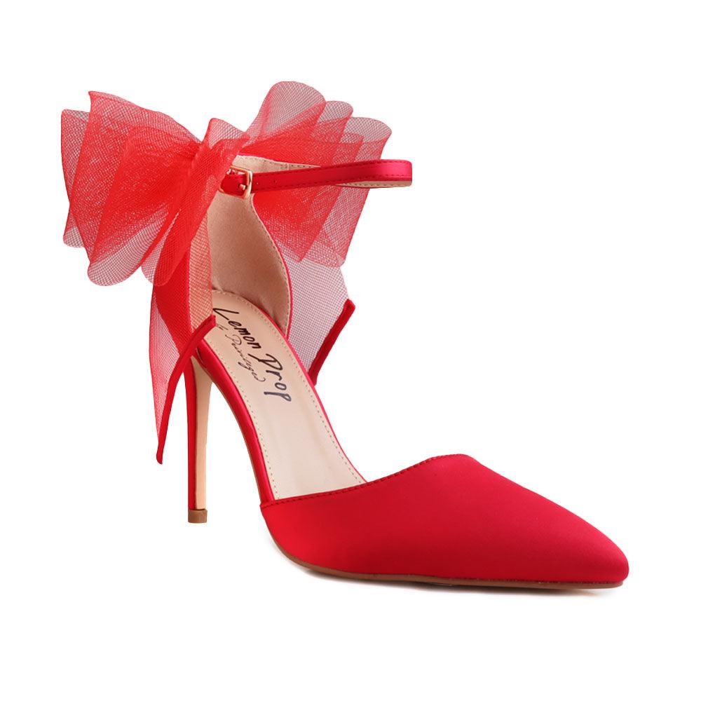 Red coloured women's heel with front and back bow-corner view