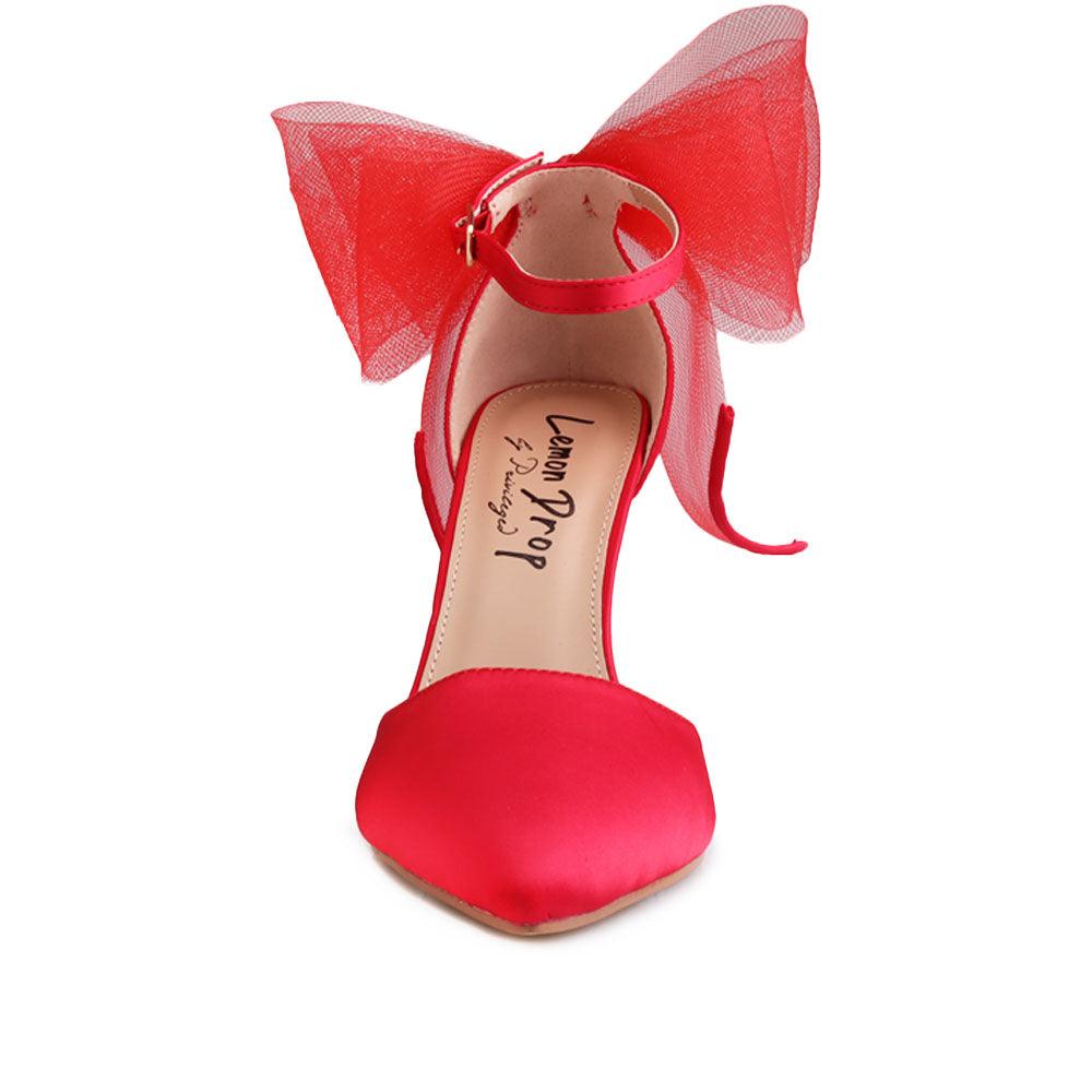 Red coloured women's heel with front and back bow-front view