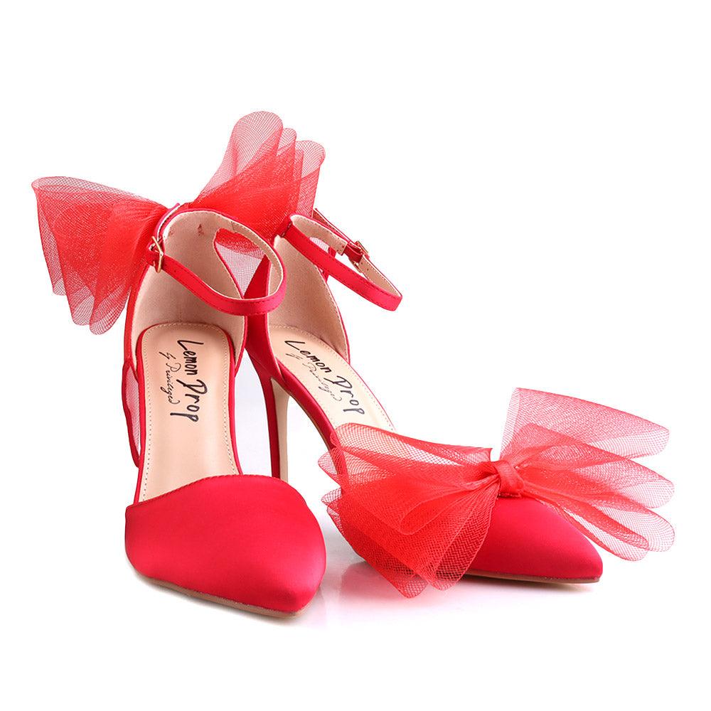 Red coloured women's heel with front and back bow