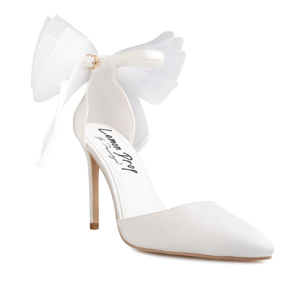 White coloured women's heel with front and back bow-corner view