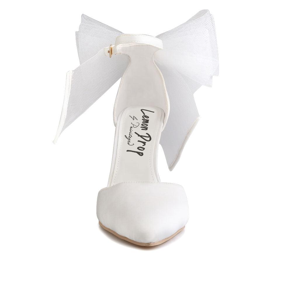 White coloured women's heel with front and back bow-front view