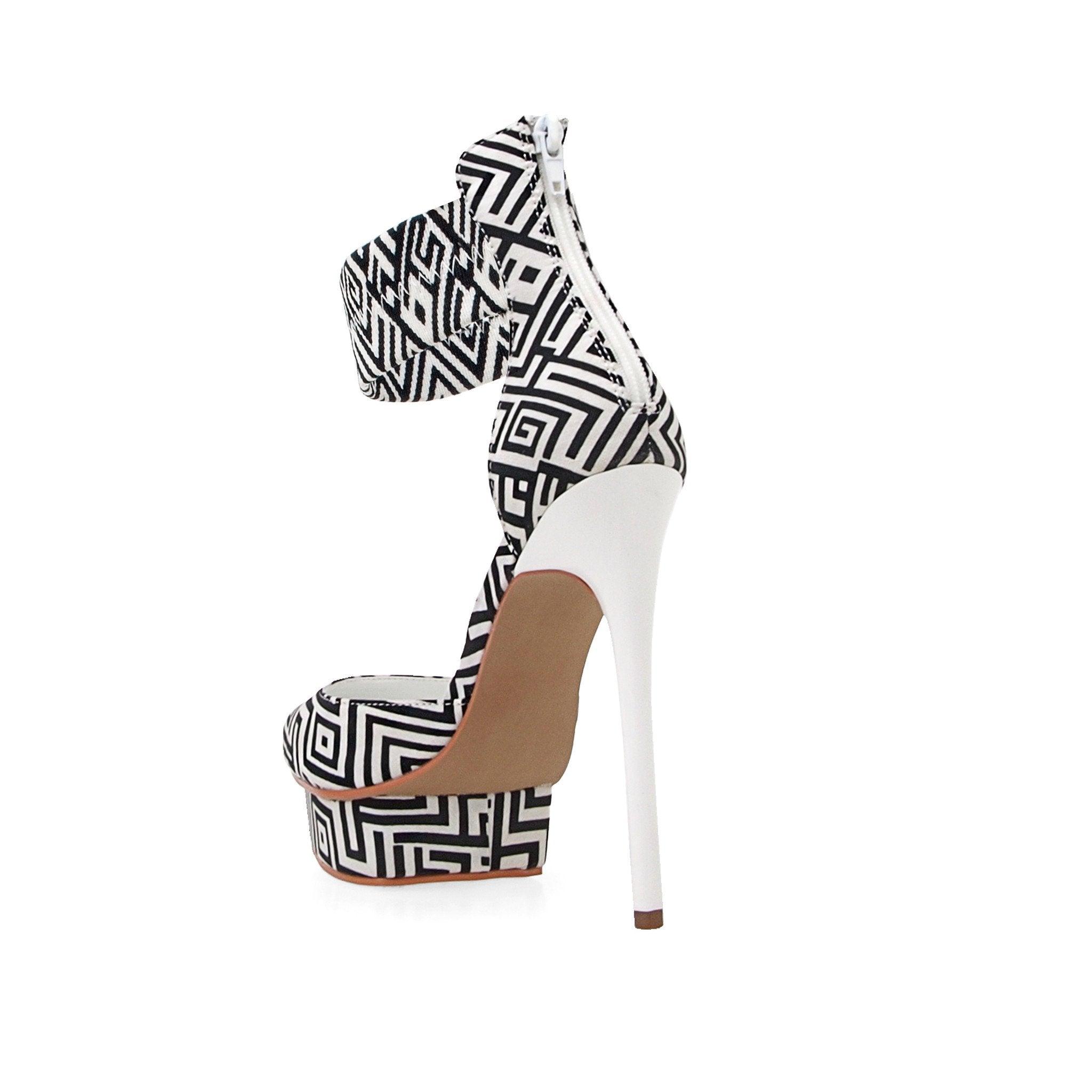 Black and white canvas fabric women's sandal heel-posterior view