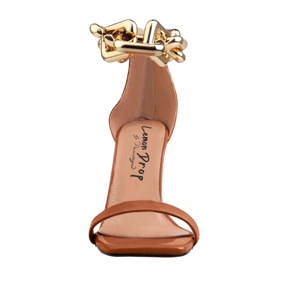 Cognac coloured, synthetic soled, vegan leather women's sandal heel with heavy chain detailing-front view