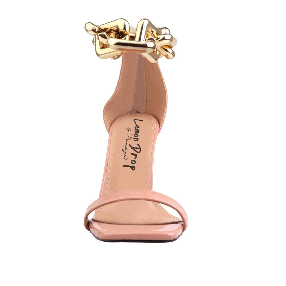 Synthetic soled, vegan leather women's sandal heel with heavy chain detailing in nude-front view