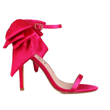 Fuchsia coloured and satin covered upper spiked women heel  