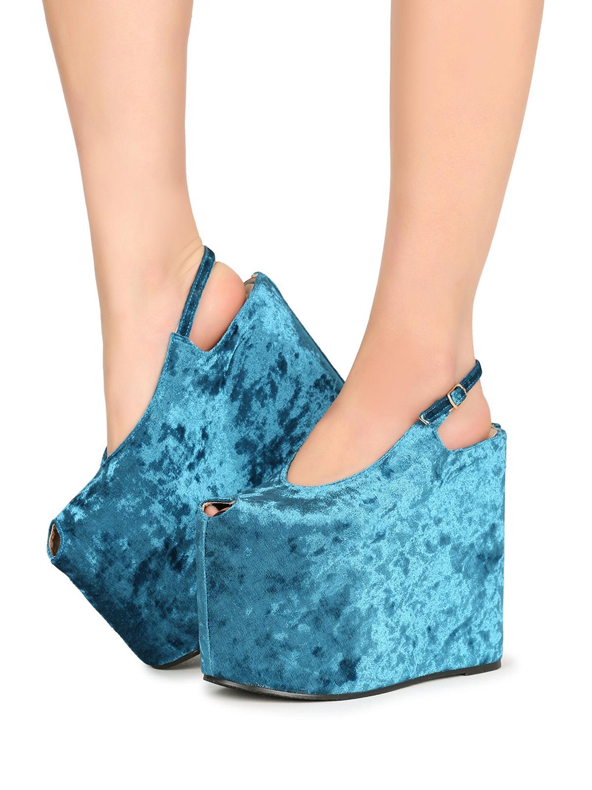 teal colored platform with upper velvet 