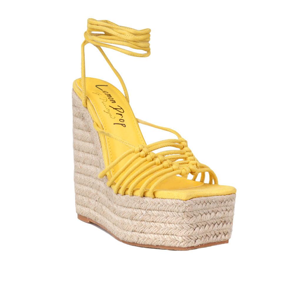 Wraparound ankle strap women shoes in mustard color - corner view