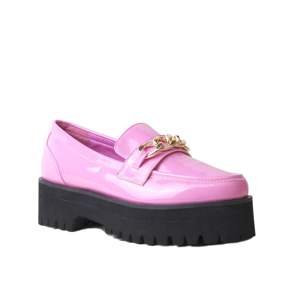 Women's pink leather shoes with a metal chain and a thick black heel-corner view