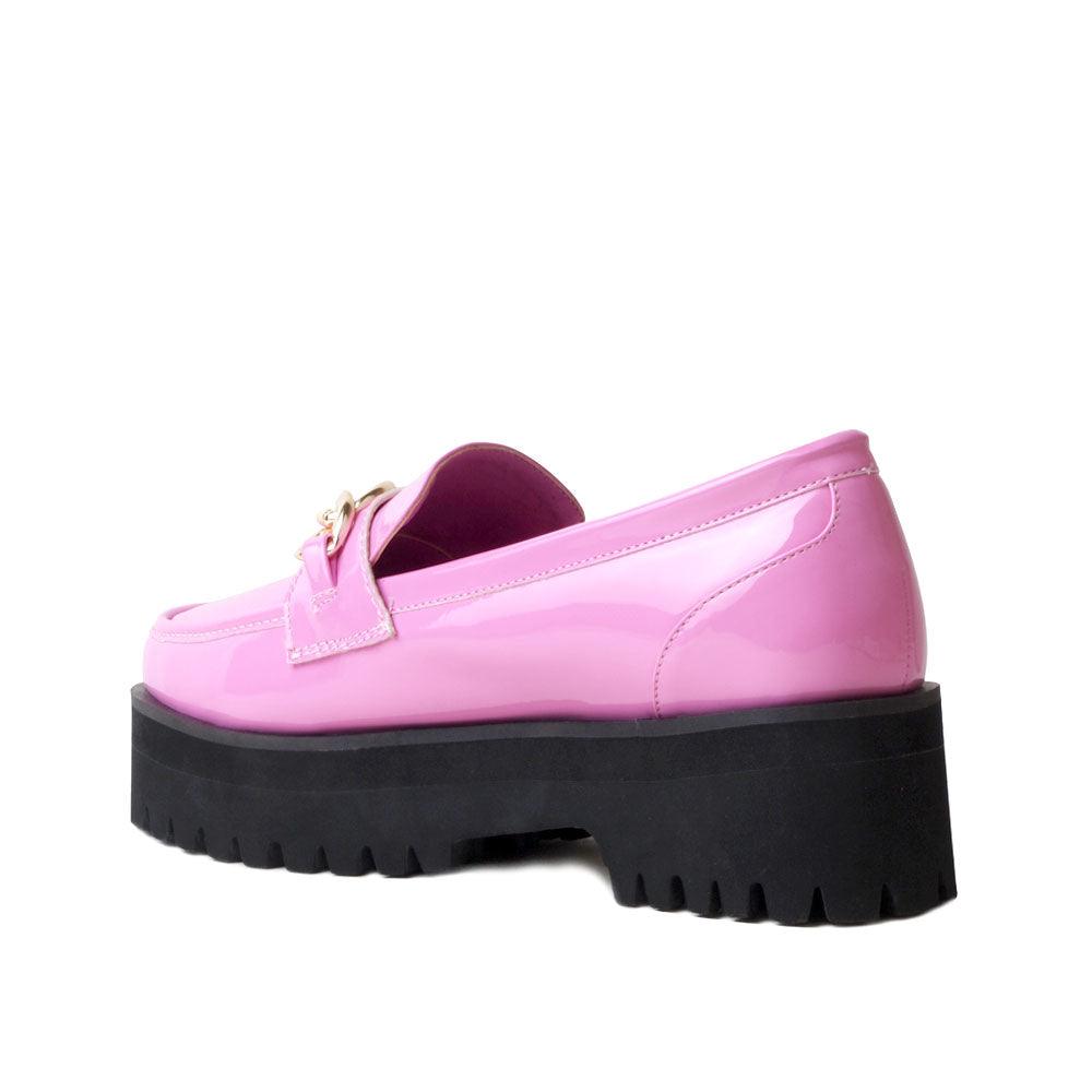 Women's pink leather shoes with a metal chain and a thick black heel-posterior view