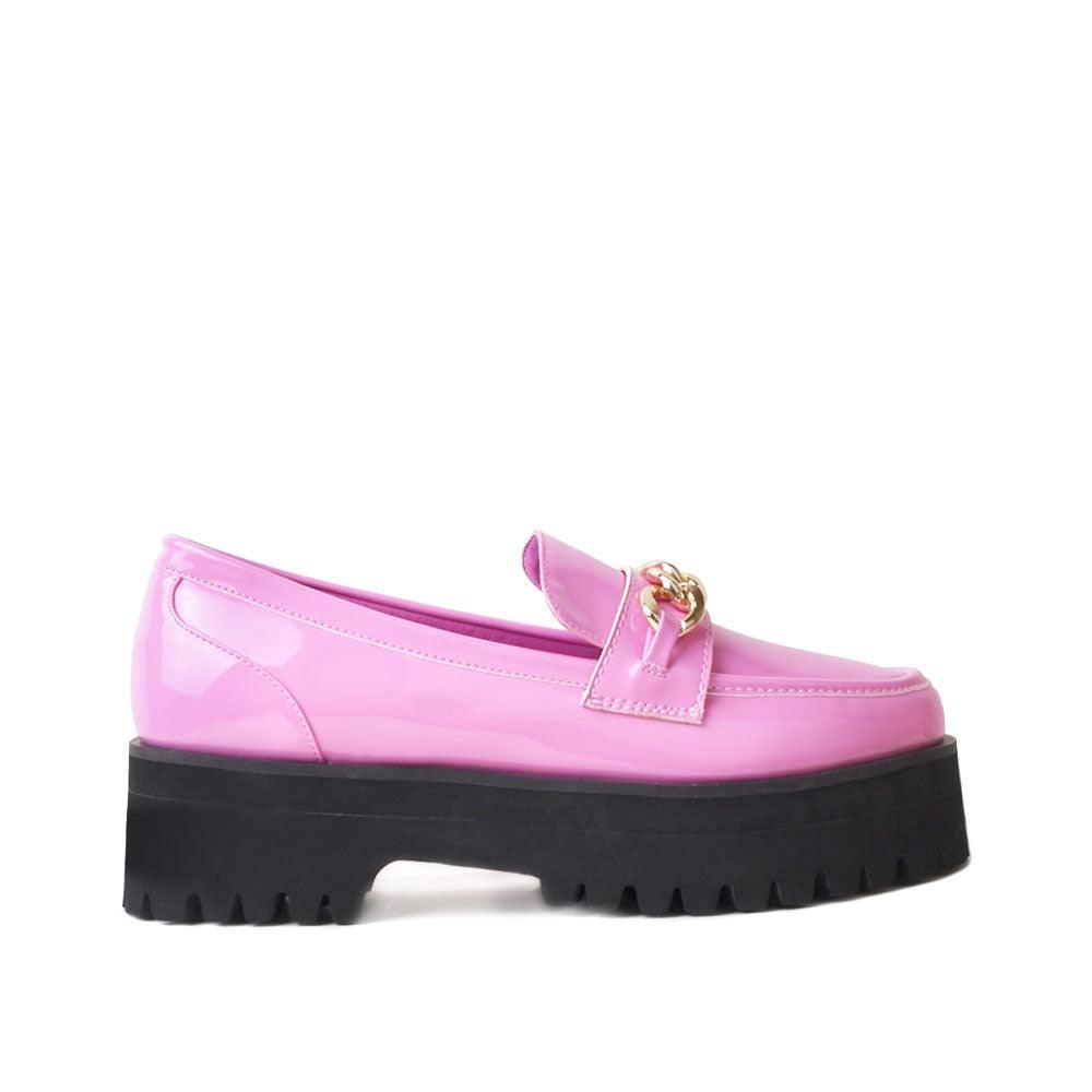 Women's pink leather shoes with a metal chain and a thick black heel-side view