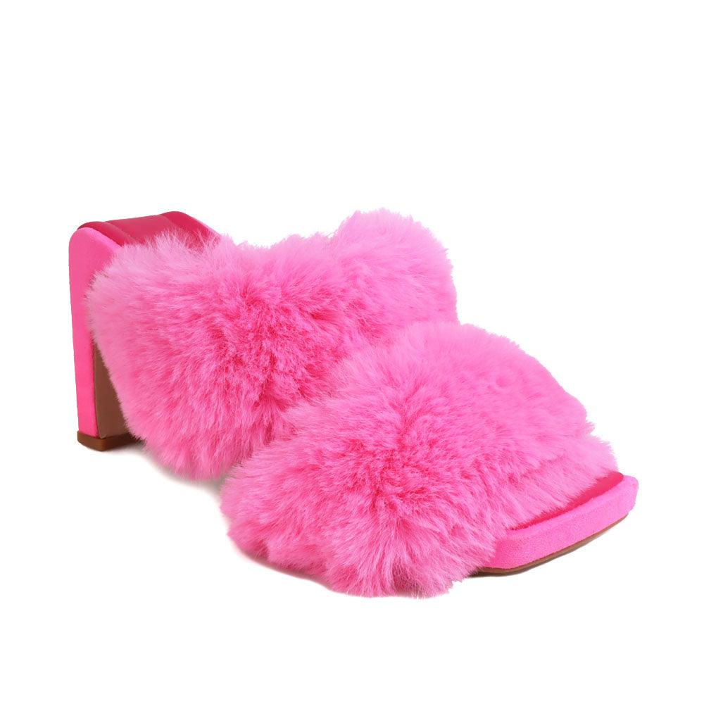 Pink colored toe heel open platform with furry heeled slippers-corner view