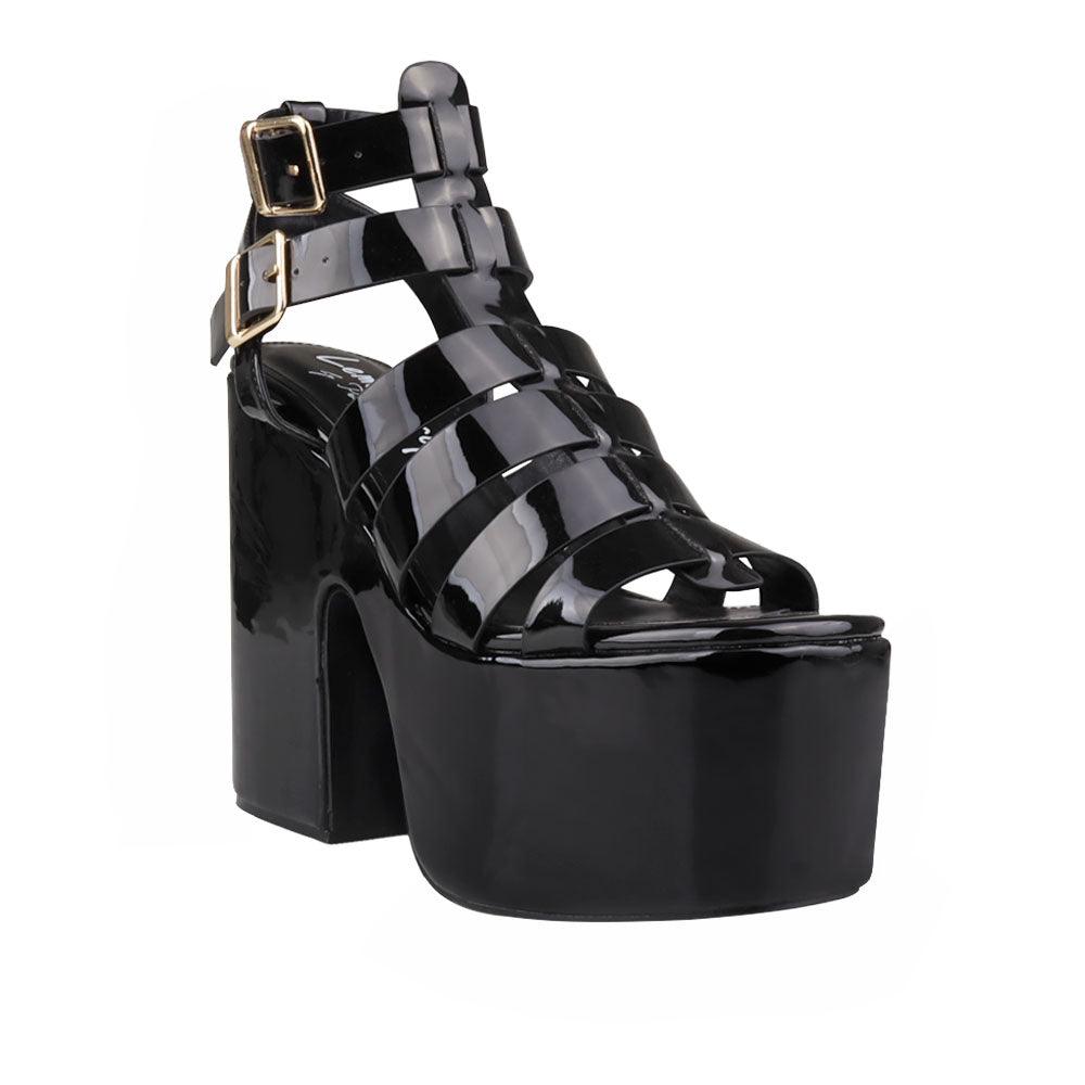 Black-colored  wedge block heels for women with double sandal buckle and strap design-corner view