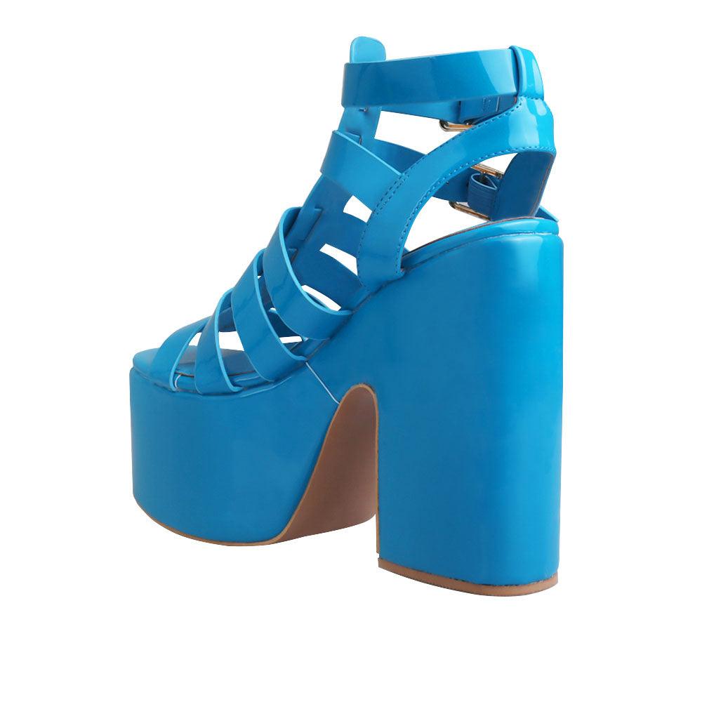 women Block heels wedge in turquoise color with strap design and double sandal buckles -posterior view