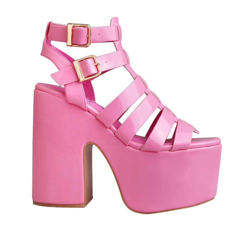 Women wedge block heels in pink  color with double sandal buckle and strap design - side view