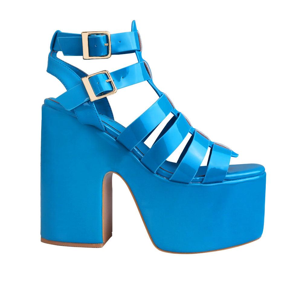 women Block heels wedge in turquoise color with strap design and double sandal buckles-side view