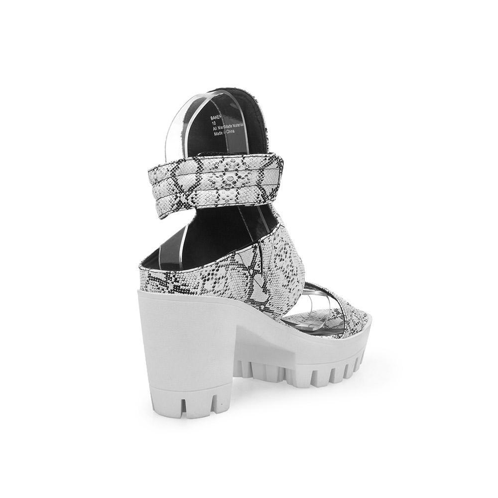 Platforms in white with an ankle fastening and a black-white snake design upper-posterior view