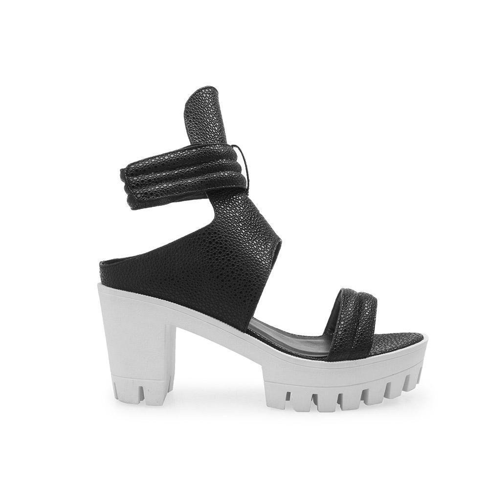 Ankle fastening black upper with white color platform heels-side view