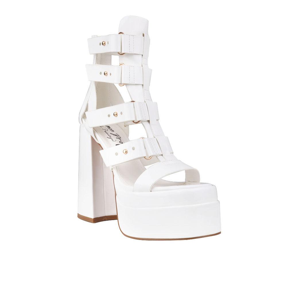 white-colored platform heels for ladies with ornamental buckle straps and ankle buckle clasp-corner view