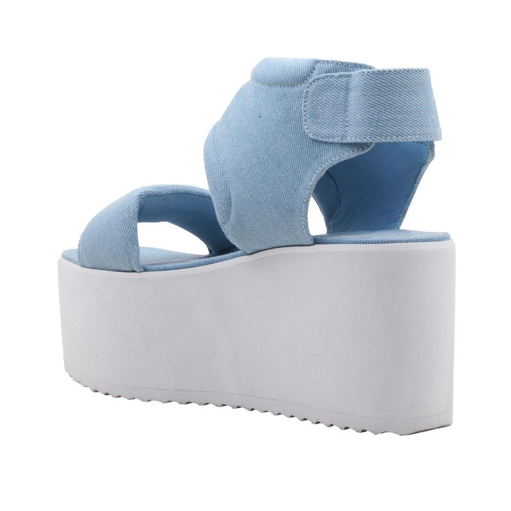 women's platform shoes with denim upper velcro closure and white bottom-posterior view