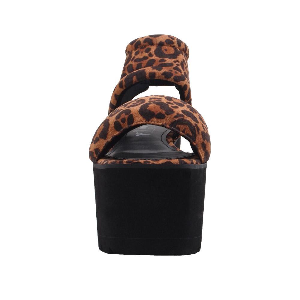 Women's platform shoes featuring tan-leopard design on the upper, velcro clasp, and a black sole-front view