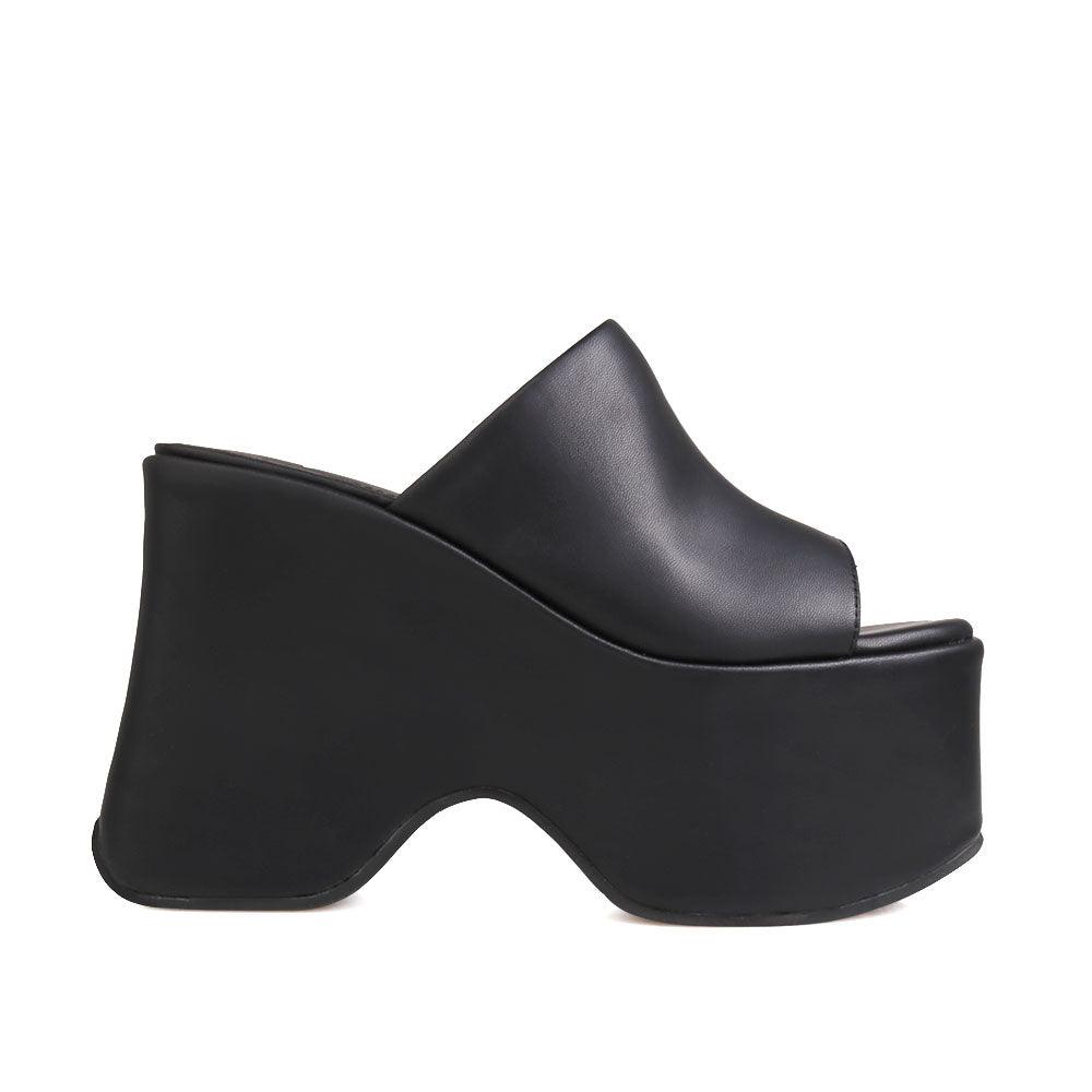 women's slip-on plain black-colored platform-side view