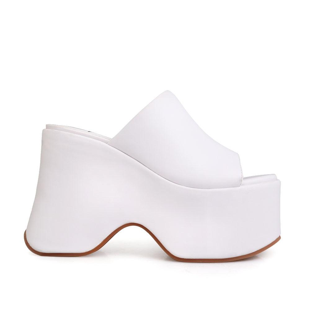 women's white platform in a slip style-side view