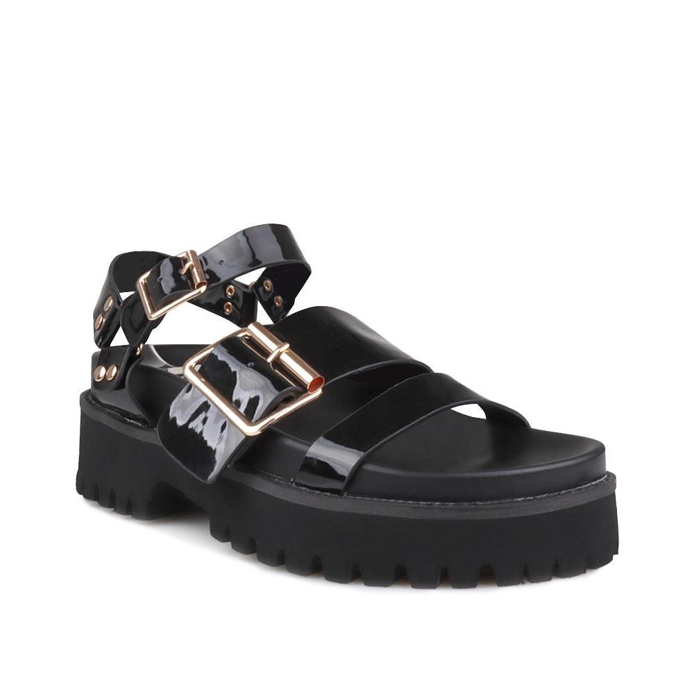 Women's platform in black-color with buckle straps and ankle buckle fastening-corner view