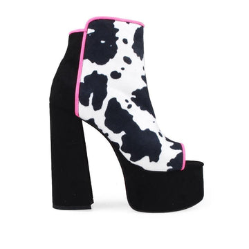 Black-colored women's ankle platform block heels with open toe, black-white pattern upper and side zipper closure.