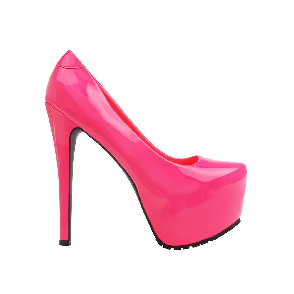 Women's neon pink-colored platform pointed heel slip-on shoes.