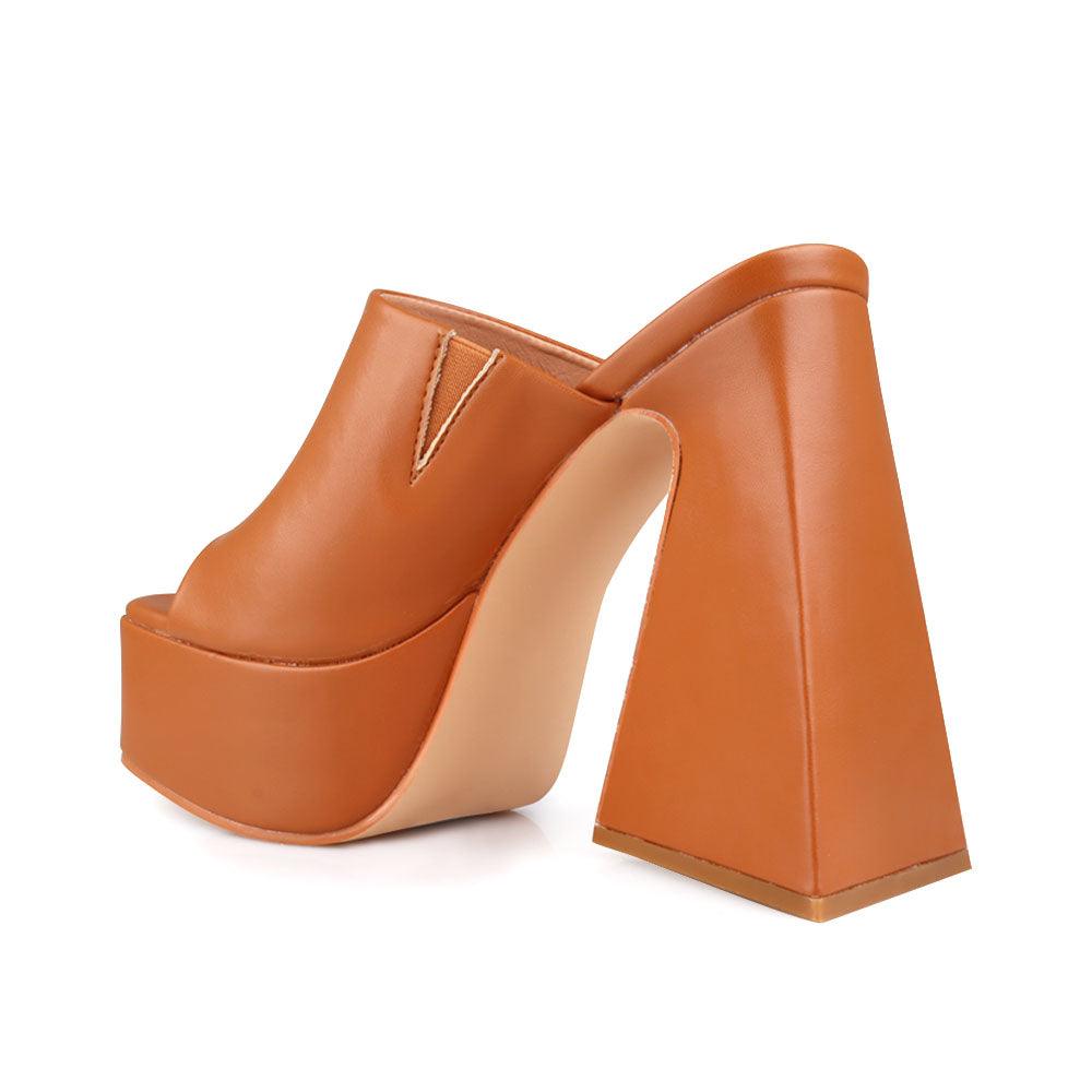 Camel-colored open-toe platform block heels with rubber top and slip-on design-posterior view