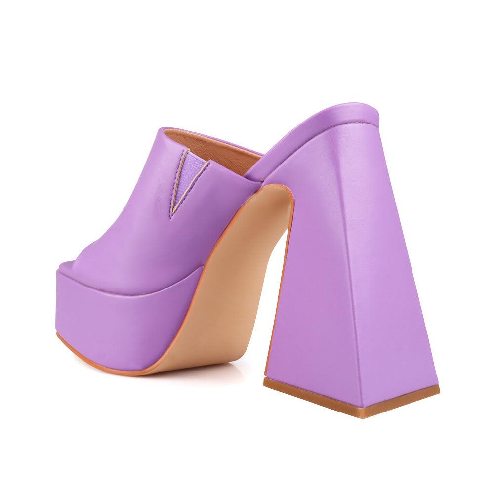 Purple-colored open toe platform block heels shoes with rubber upper and slide in style-posterior view