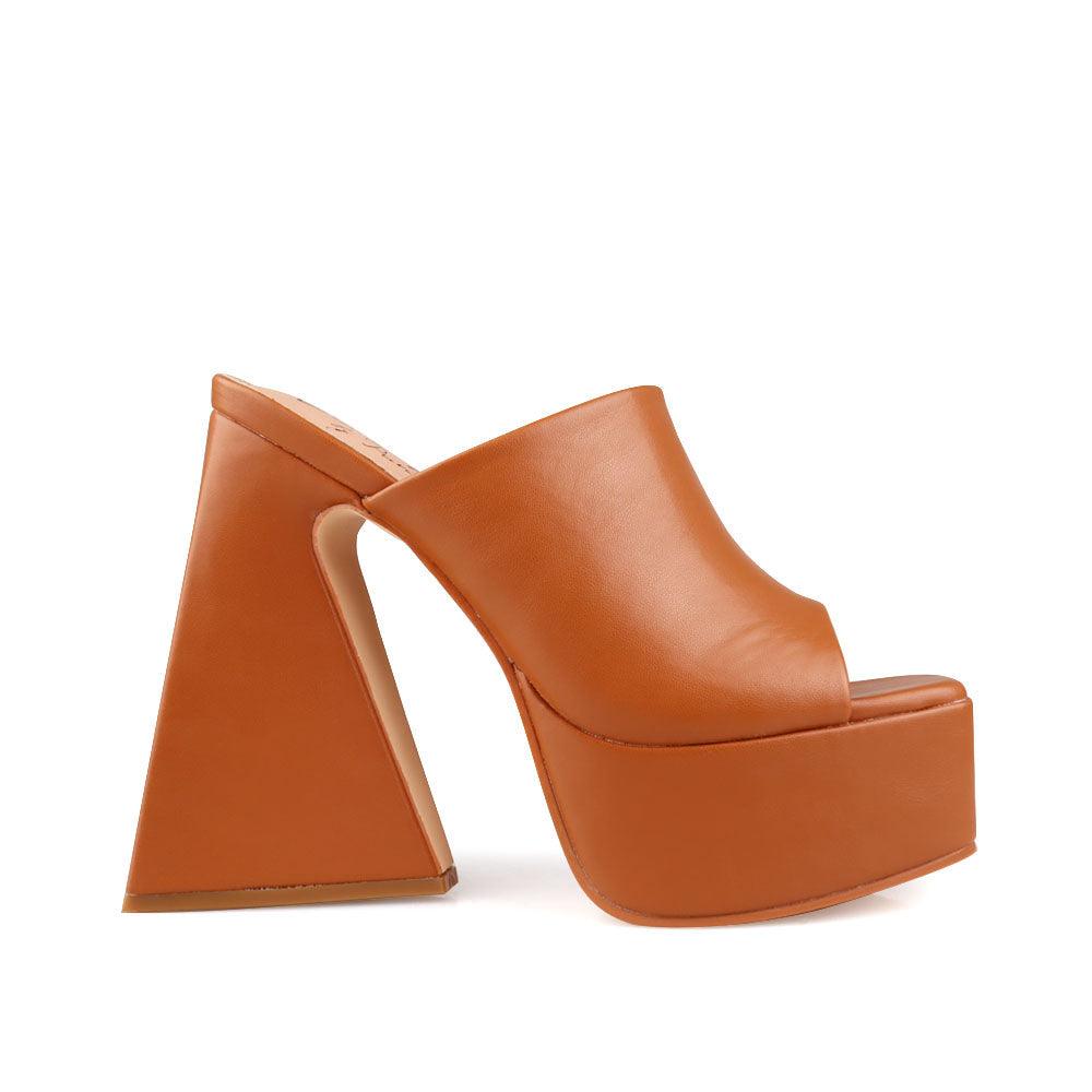 Camel-colored open-toe platform block heels with rubber top and slip-on design-side view