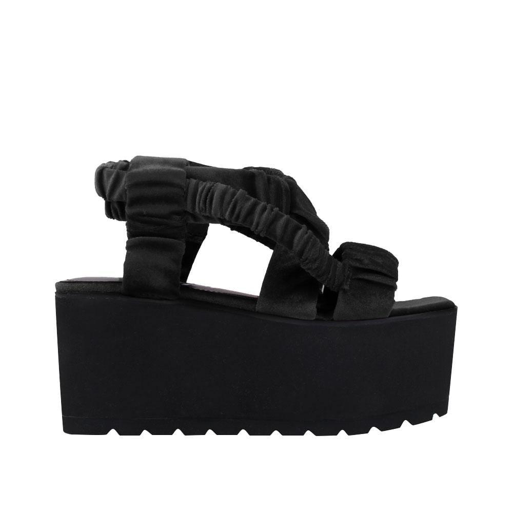 Black women shoes with black colored platform-side view