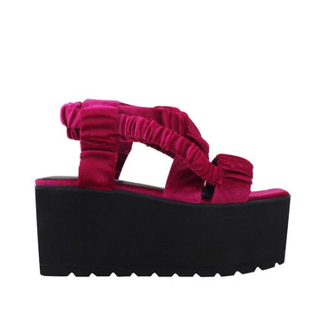 Plum women shoes with black colored platform-side view