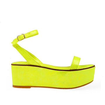 Neon yellow colored women platforms with ankle buckle closure