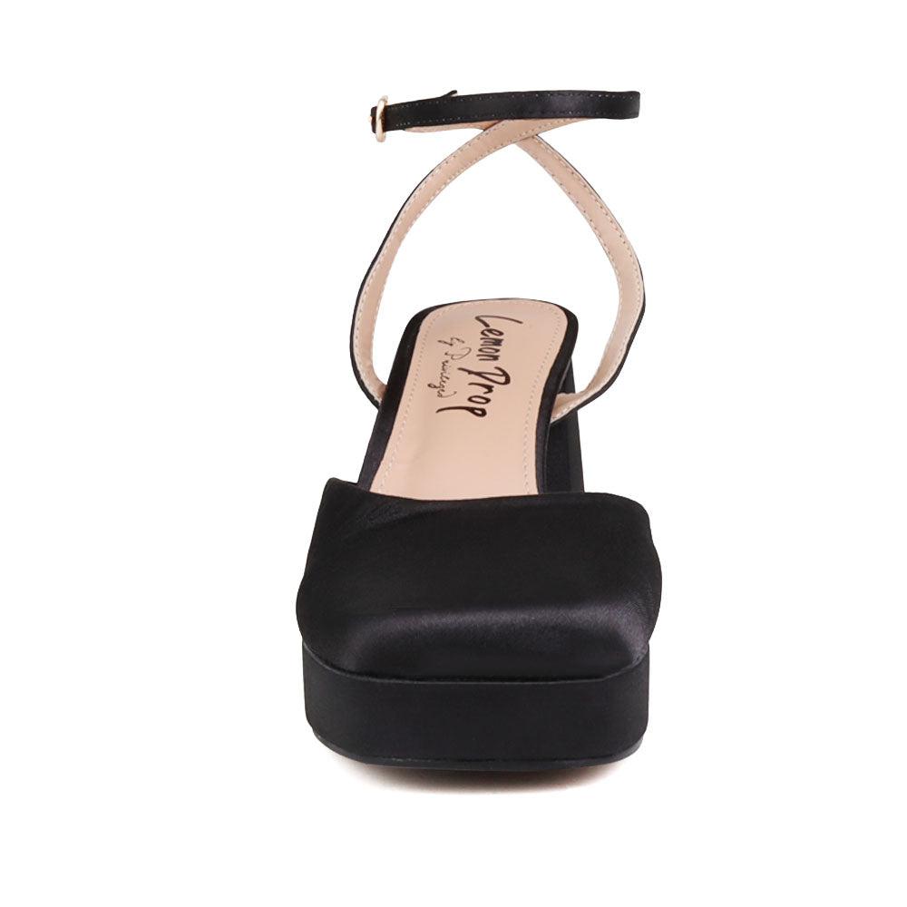 Black colored women platforms with ankle buckle-front view