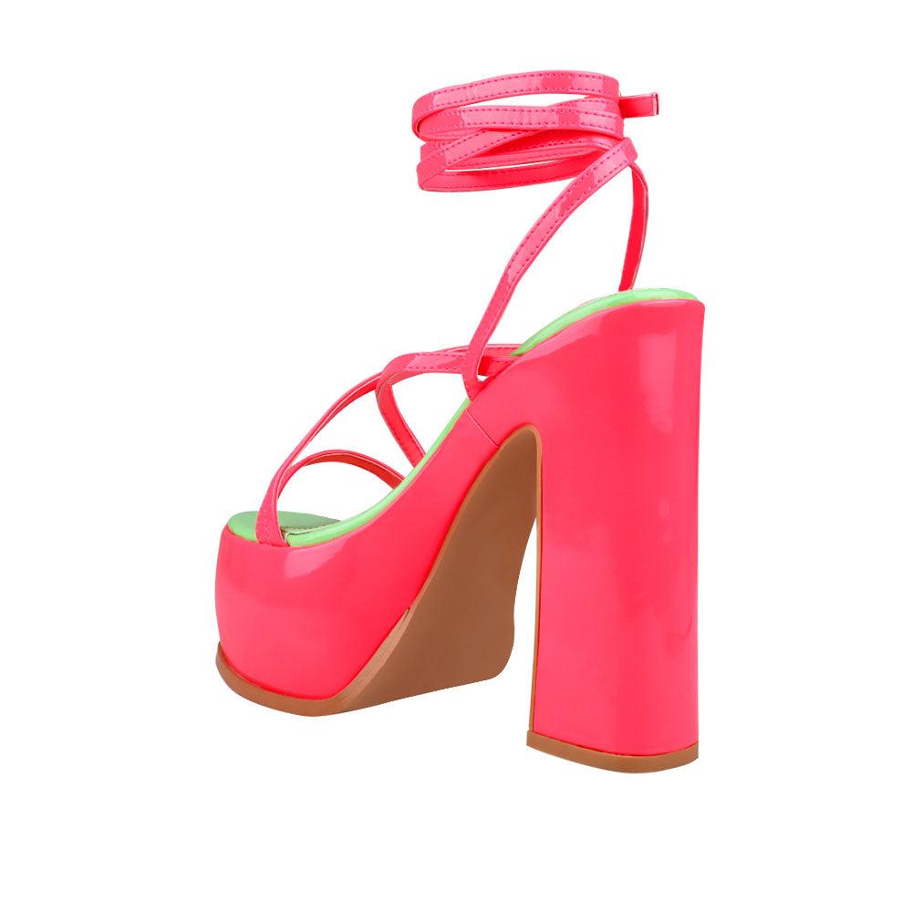 Pink colored women platform heels with straps-posterior view